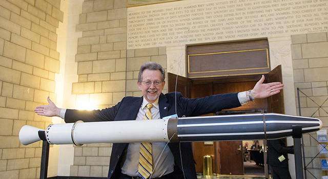NASA Planetary Science Director Jim Green, seen here with an original model of Explorer 1.